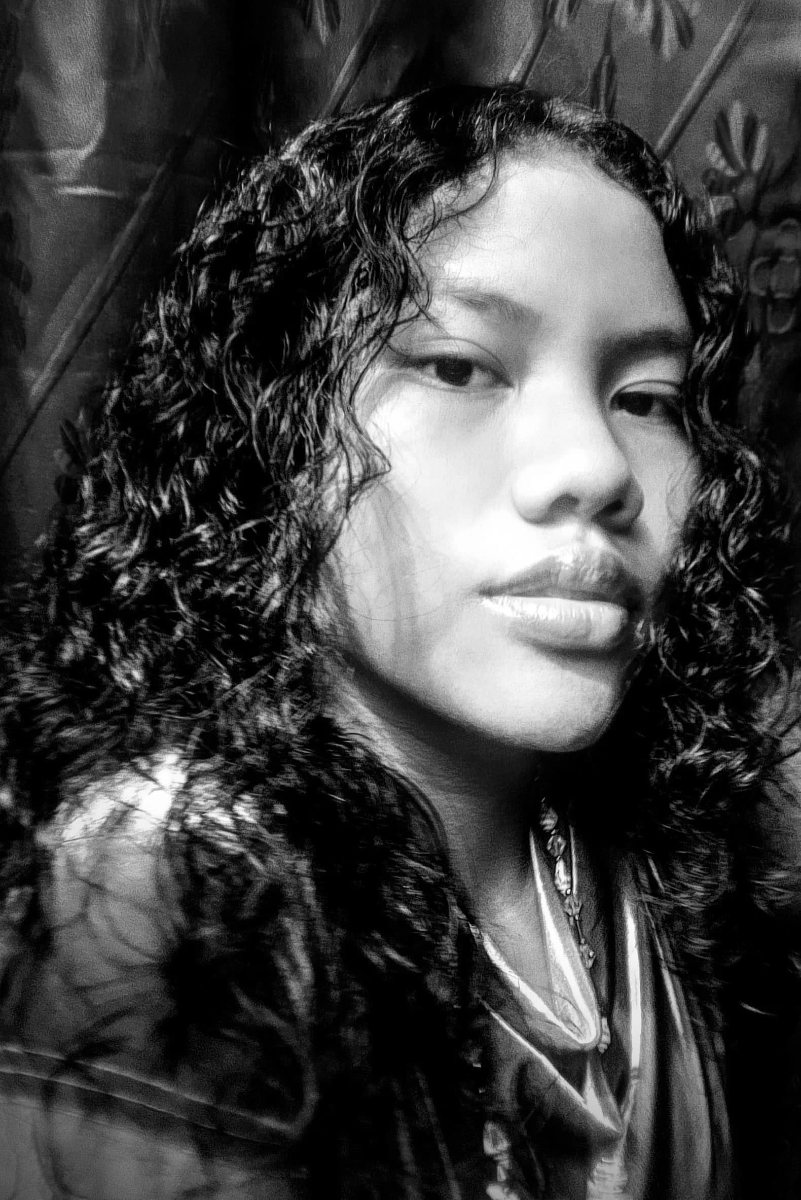 Headshot photograph.